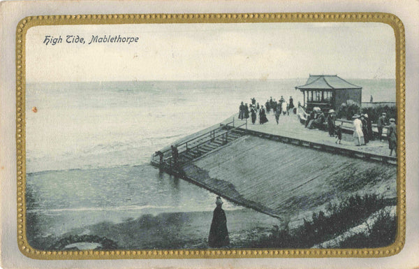 Old embossed postcard of High Tide, Mablethorpe, Lincolnshire