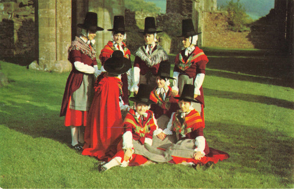 Old postcard showing Welsh Folk Dancers in authentic national costume