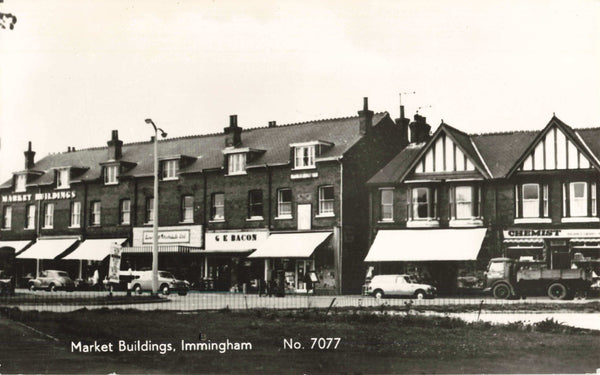 Old real photo postcard of Market Buildings, Immingham in Lincolnshire