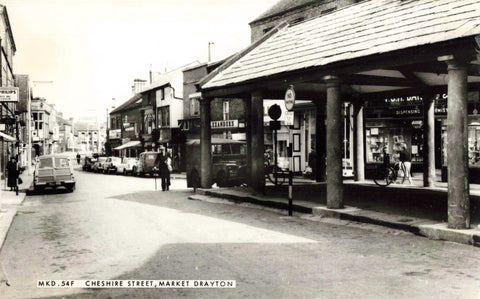 Old real photo postcard of Cheshire Street, Market Drayton, Shropshire