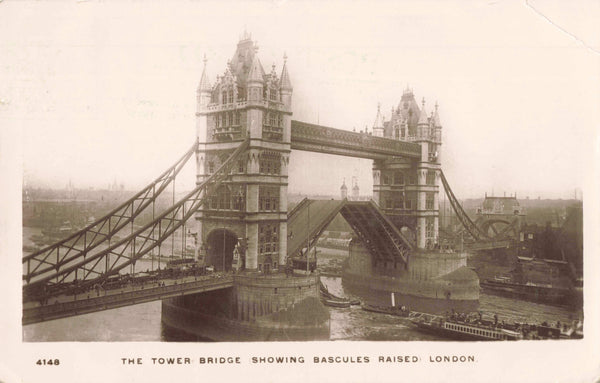 1911 Real photo postcard of Tower Bridge, London, bascules raised