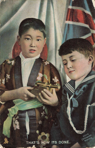 1917 Japanese postcard of boys with toy canon