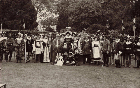 Old real photo postcard of people in fancy dress