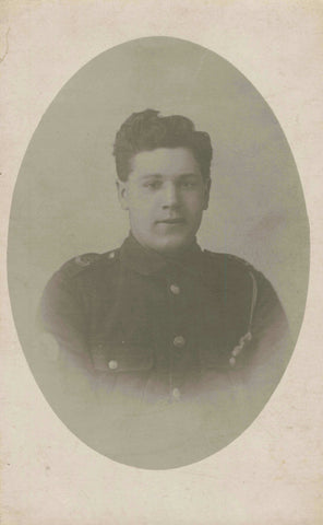 Unidentified man in uniform, real photo postcard