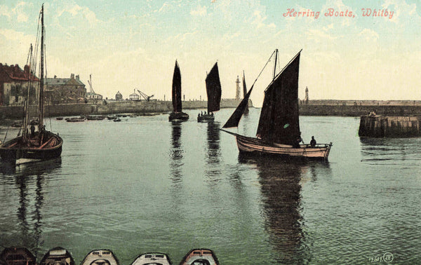 Old postcard of Herring Boats, Whitby in Yorkshire