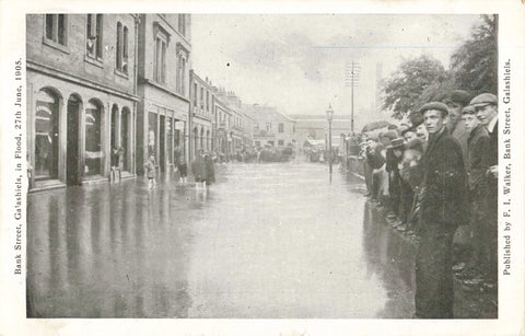 Old postcard showing Bank Street, Galashiels in Flood, 27th June 1905