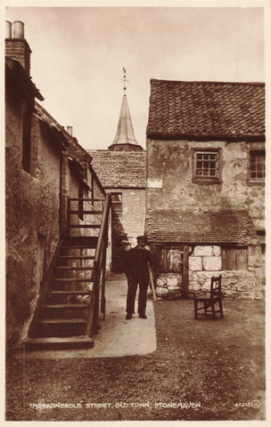 Old real photo postcard of Threadneedle Street, Stonehaven in Aberdeenshire