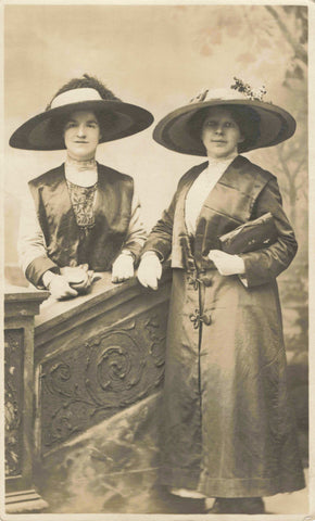 Old real photo postcard of two ladies with big hats