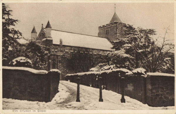 Old postcard of Rye Church in snow 