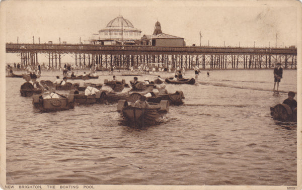 Old postcard of New Brighton Boating Pool with pier in the background